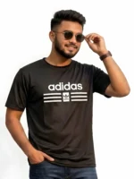 Close up of man wearing an Adidas men's black mesh t-shirt with a raised 3D pumped print logo