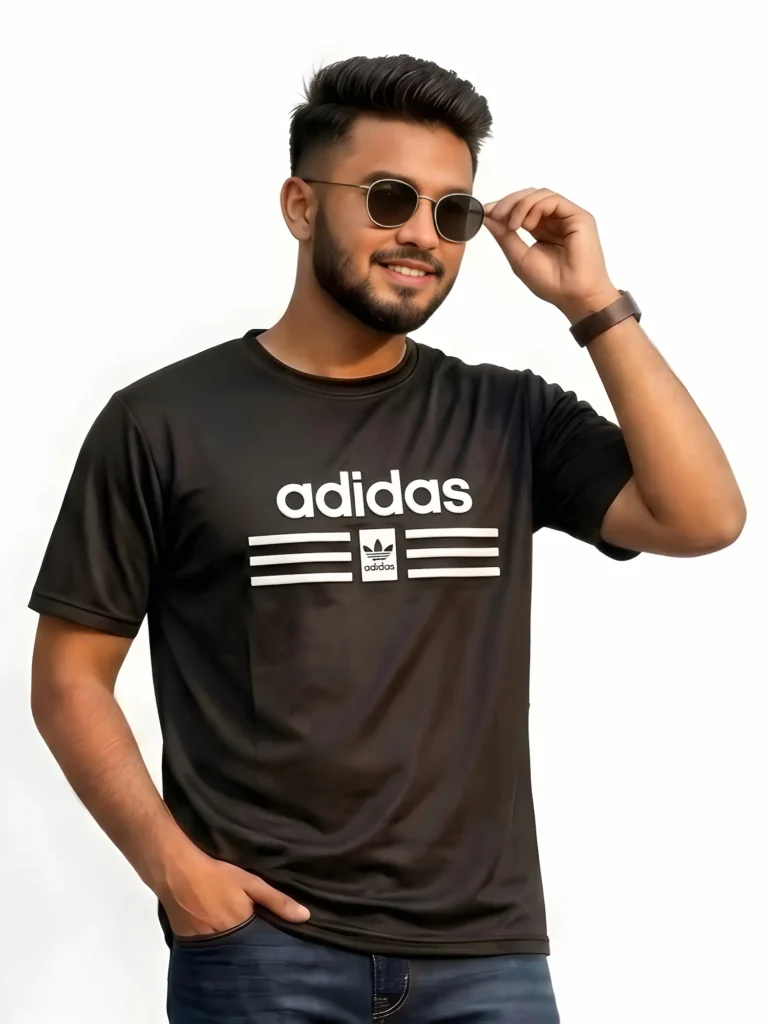 Close up of man wearing an Adidas men's black mesh t-shirt with a raised 3D pumped print logo
