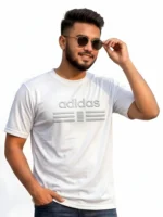 Close up of man wearing an Adidas men's black mesh t-shirt with a raised 3D pumped print logo