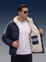 Inside view of thick plush fleece lining and inner pocket of an Adidas inspired jacket.