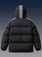 Back view of a black hooded puffer jacket featuring athletic white stripes.
