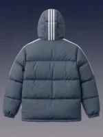 Back view of a hooded slate blue winter puffer jacket featuring white stripes down the sleeves.