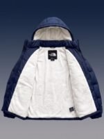 Open Navy Sherpa Puffer Jacket 700 revealing the ultra-soft, plush white sherpa fleece interior lining.
