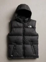 Front view of a sleek black The North Face inspired sleeveless puffer vest with an attached hood and 700 logo.