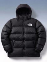 Model wearing black puffer jacket looking away